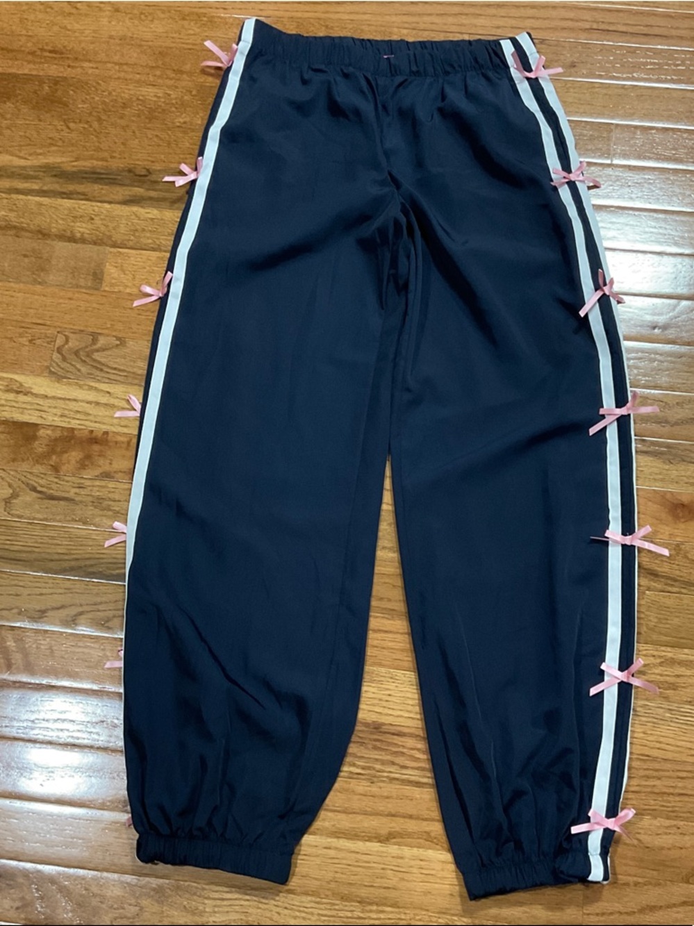 Edikted Navy Track Pants with White Side Stripe & Pink Bows